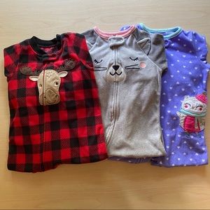 Set of three pairs of 12 month footie pajamas